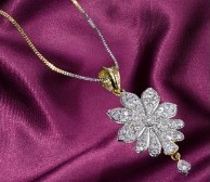 Lab grown diamond flower pendant in gold